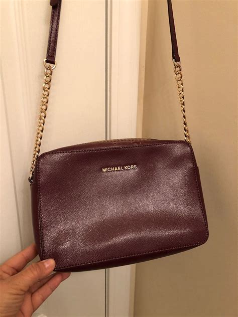 burgundy michael kors crossbody.